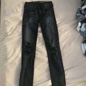 distressed black american eagle jeans